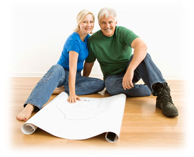 couple looking at blueprints