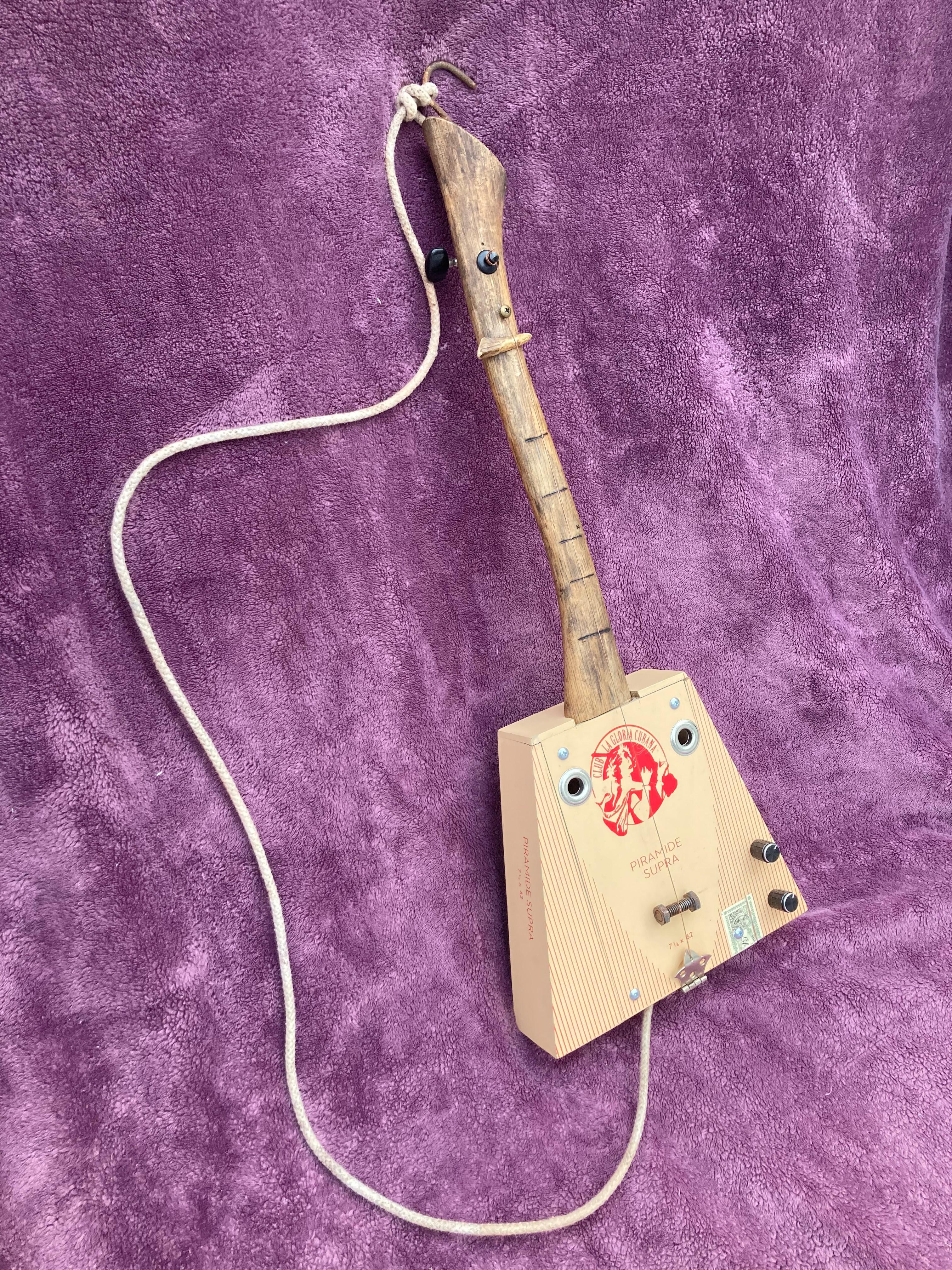 Axe shaped Cigar Box Guitar